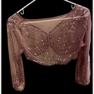 Gently used sequenced jacket overlay, small, unsure of brand.  Lacy material.